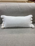 White pom pom lumbar pillow