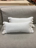 White pom pom lumbar pillow