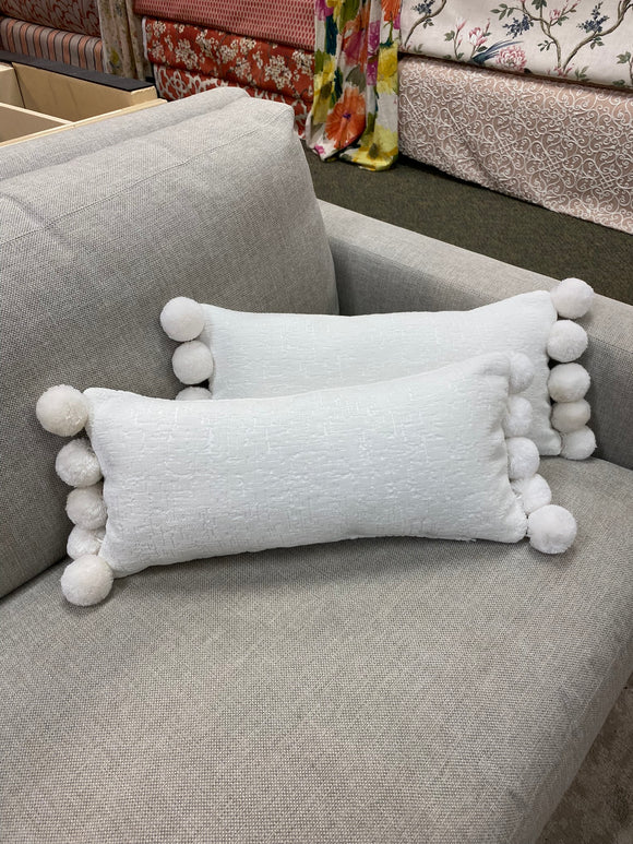 White pom pom lumbar pillow